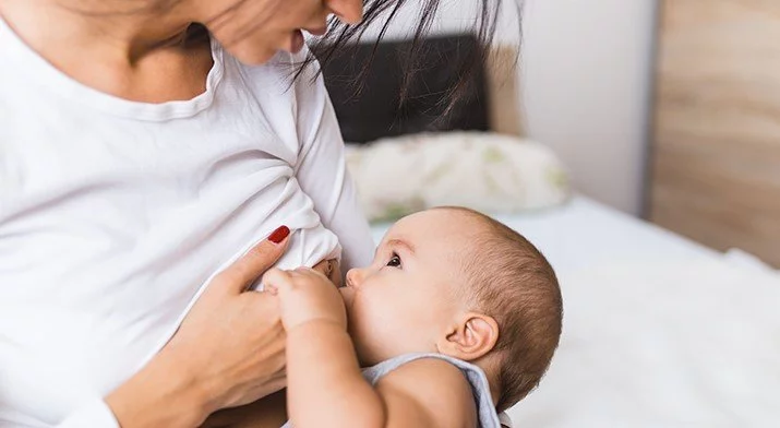 Woman breastfeeding a baby